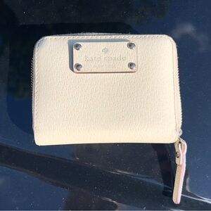 Kate Spade logo small cream zip around wallet leather
